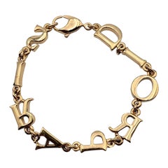 Christian Dior Vintage Gold Spell Out Dior Paris Letter Bracelet
