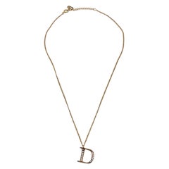 Christian Dior Gold Metal D Crystal Logo Pendant Chain Necklace