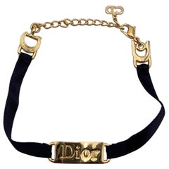 Christian Dior Vintage Gold Metal Black Ribbon Logo Plate Bracelet