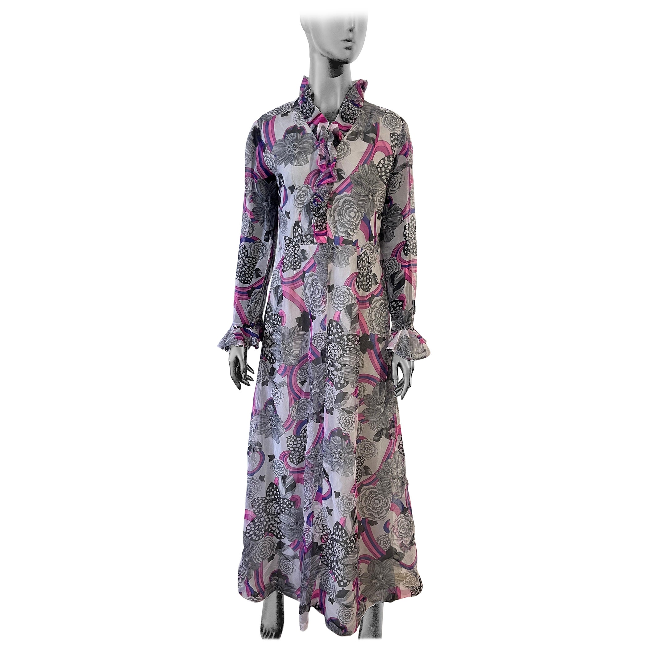 A spectacular vintage 1970’s patterned long evening dress For Sale