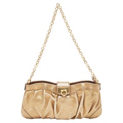 Salvatore Ferragamo Gold Leather Chain Clutch