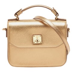 Borsa MCM in pelle color bronzo con patta e manico superiore