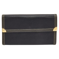 Cartera Internacional Louis Vuitton Porte Tresor de piel negra