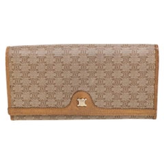 Portafoglio Celine Beige in tela e pelle Coates