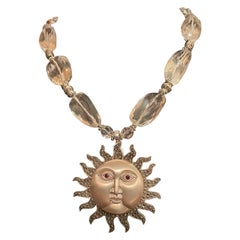 LB offers a mid 20th c. Sterling Marcasite Sun brooch pendant crystal necklace