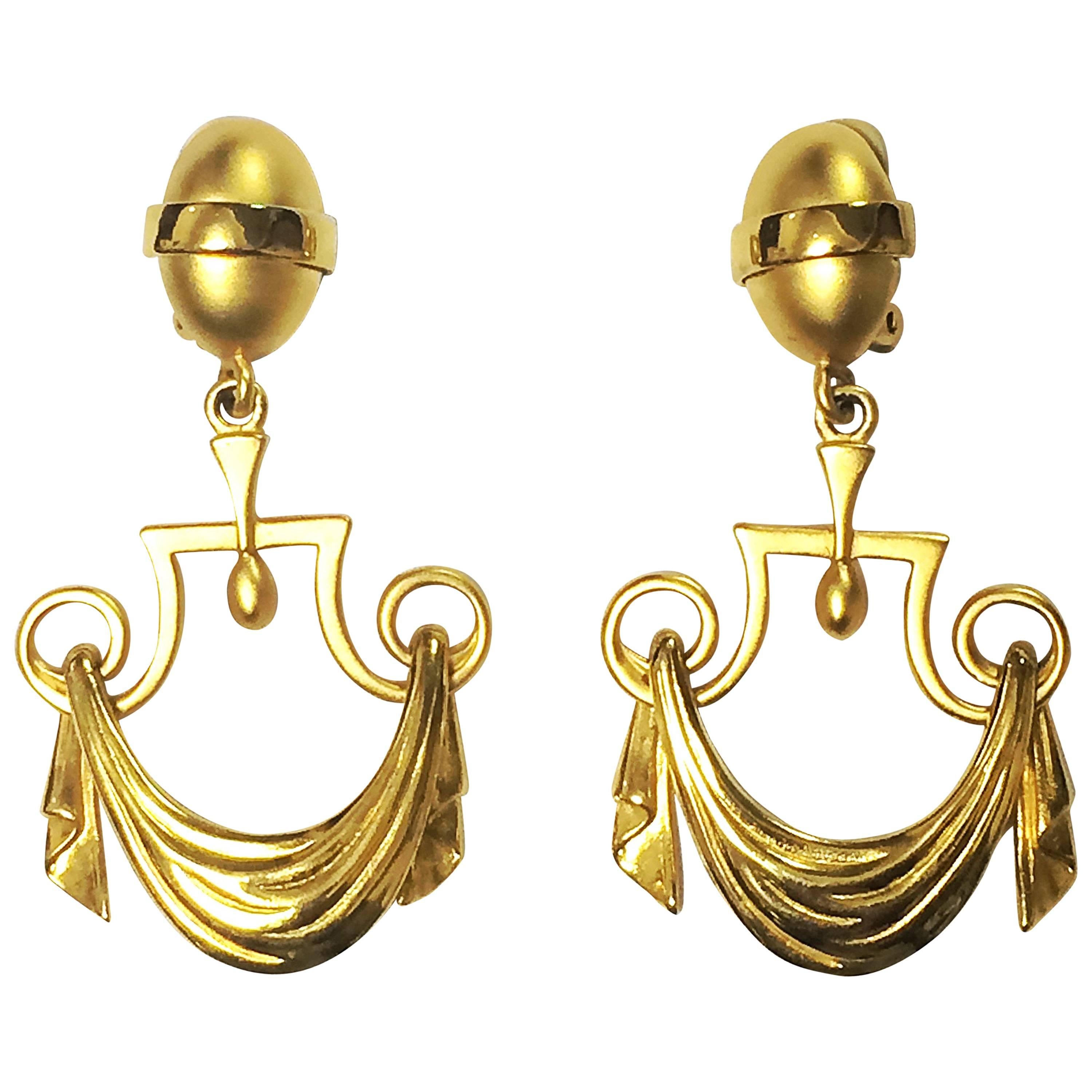 Vintage Karl Lagerfeld golden dangling earrings in drapery window curtain design For Sale