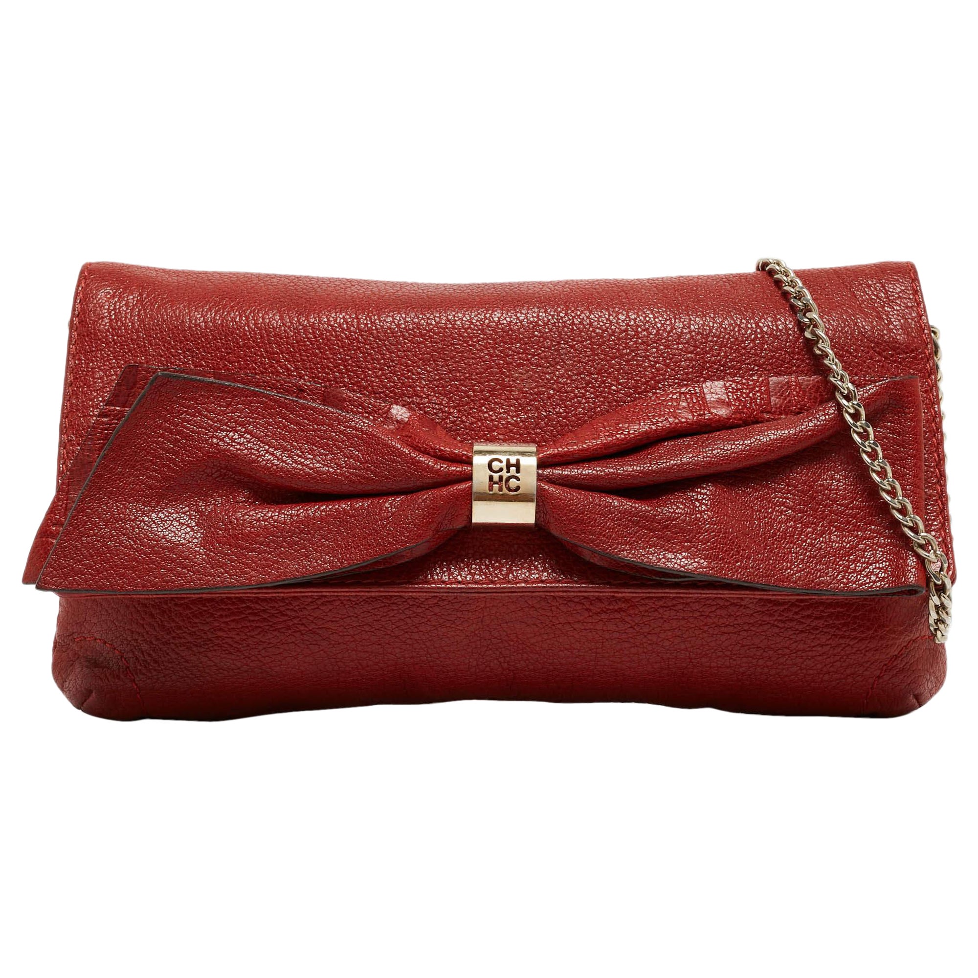 Carolina Herrera pochette en cuir rouge avec nœud papillon CH en vente
