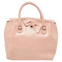 Valentino Fourre-tout à nœud en cuir rouge vieux rose