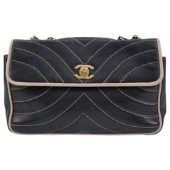 Chanel Chevron Flap Bag in Quilted Lambskin Leather with Gold tone Hardware