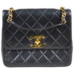 Vintage Chanel Black Quilted Leather Gold Chain Strap "CC" Lock Shoulder Bag