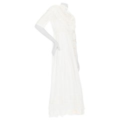 Christian Dior Weißes Kurzärmeliges Kleid aus Baumwolle mit Fransen und Ösen