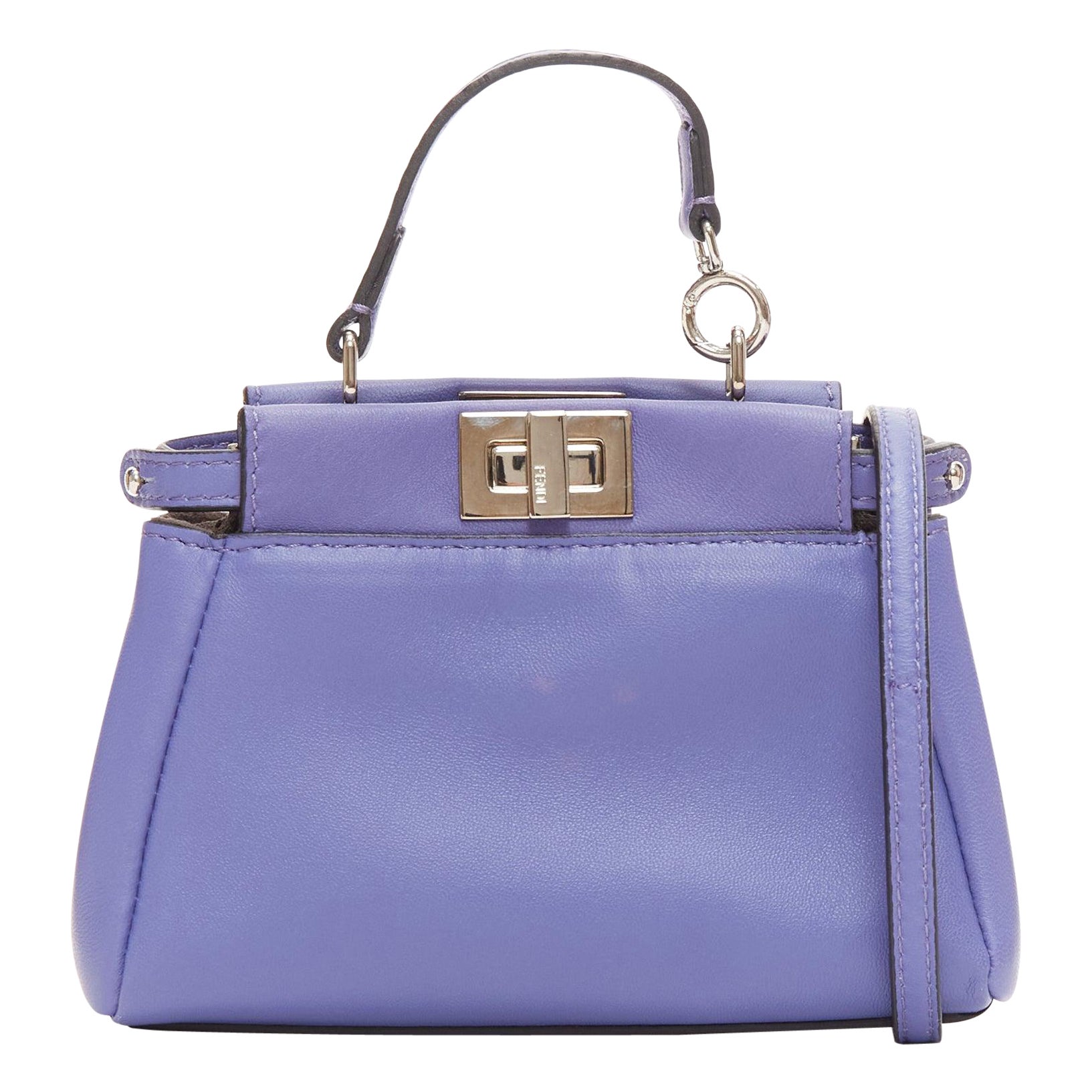 How do I open the sides on a Fendi Peekaboo Mini?