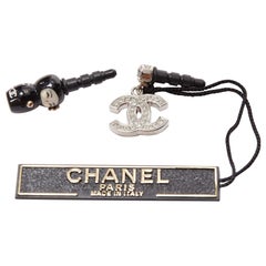 CHANEL silver crystal CC black china doll earphone jack charm x2