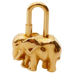 HERMES 1988 Limited Elephant Cadena plaqué or breloque de sac à serrure