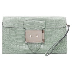 HERMES Goodlock Porosus mint green scaled leather PHW push clasp wrist clutch