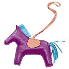 HERMES Rodeo PM purple leather brown trim fringed tail horse charm