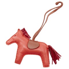 HERMES Milo Rodeo MM red leather brown trim fringed tail horse charm