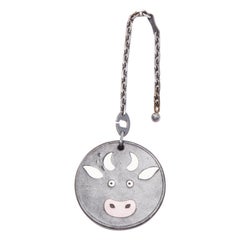 HERMES Cow Charm black leather coin ruthenium bag charm