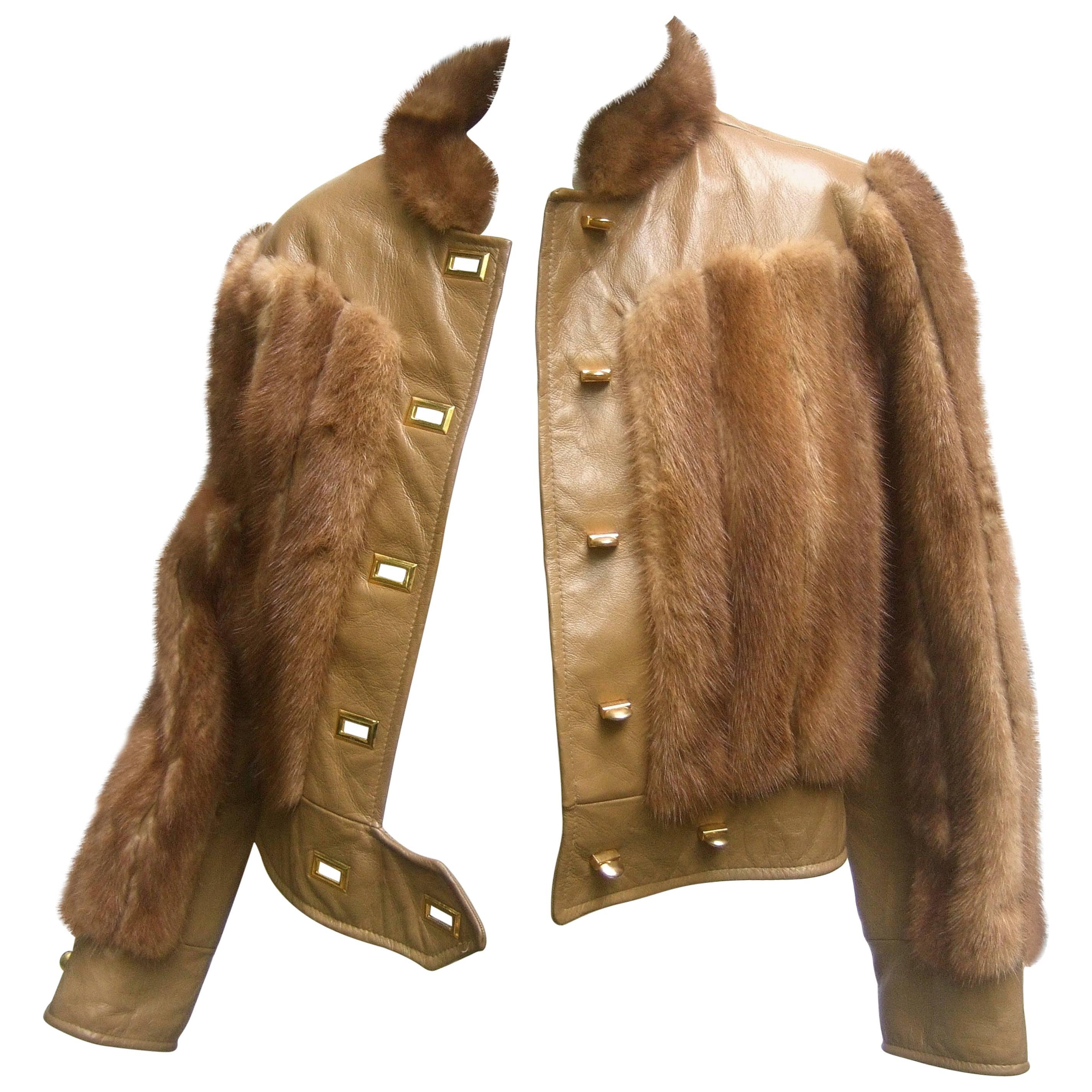 Mink & leather Eisenhower style cropped jacket c 1970s
The luxurious petite jacket is designed with plush vertical
bands of lustrous autumn brown mink fur

Juxtaposed with supple mocha brown leather borders
The mod mink & leather jacket