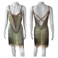 Roberto Cavalli A/I 2006: mini abito Flapper aperto sul retro, impreziosito da perline e frange