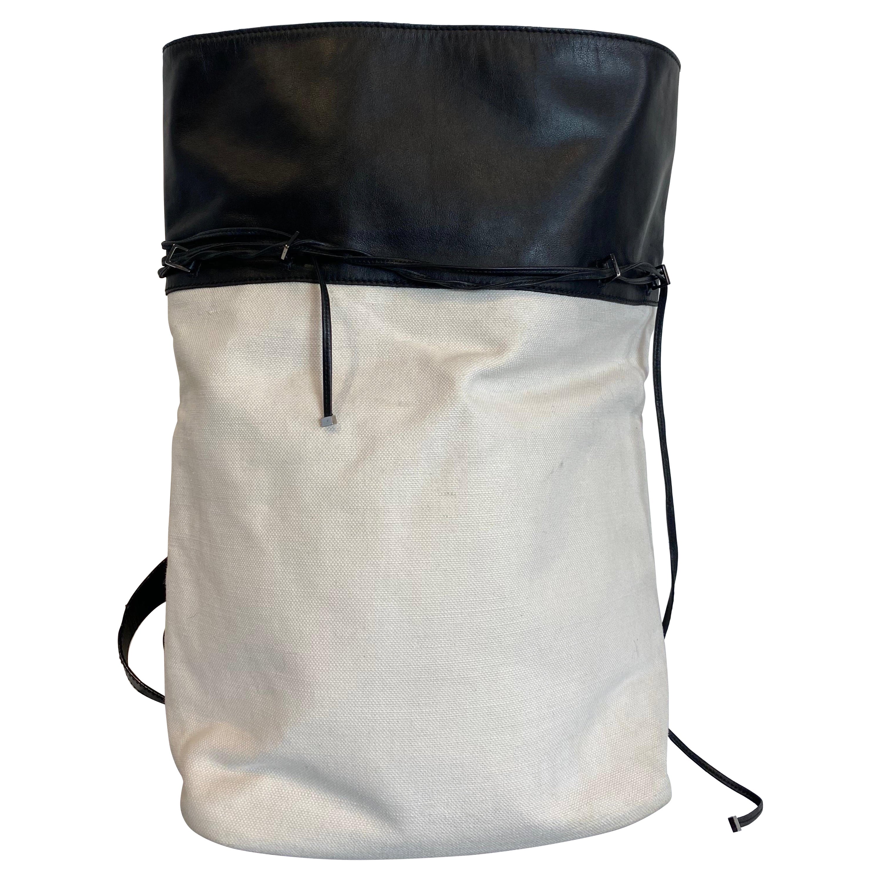 Yves Saint Laurent black and white one shoulder backpack For Sale