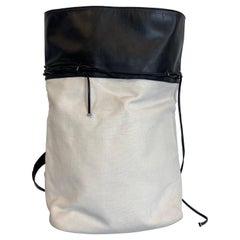 Mochila de un hombro Yves Saint Laurent en blanco y negro