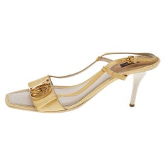 Louis Vuitton Sandalias amarillas de charol con logo en el talón talla 38