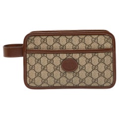 Pochette en toile et cuir GG Supreme de Gucci Brown/Tan
