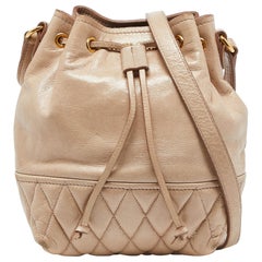 Miu Miu Bolso Bucket con Cordón de Piel Vitello Brillante Beige