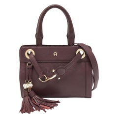 Aigner Pflaumenfarbene Cavallina-Tasche aus Leder