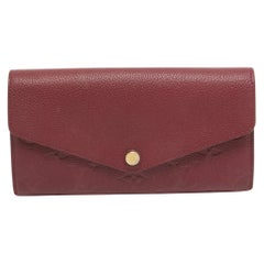 Louis Vuitton Flamme Monogram Empreinte Leather Sarah Wallet