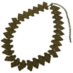 Yves Saint Laurent Cinturón de eslabones de bronce dorado