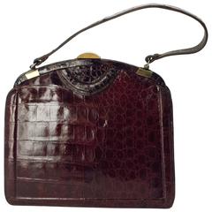 Sac à main en alligator marron foncé des années 40