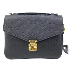 Louis Vuitton Pochette Mètis Monogram Empreinte Leather Black
