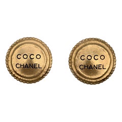 Chanel Vintage Gold Metal Round Coco Chanel Clip On Earrings