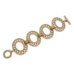 Christian Dior, bracelet fantaisie ovale vintage en métal et or
