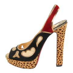 Christian Louboutin Mehrfarbige Pumps aus Kalbshaar und Wildleder mit Peep Toe Größe 41