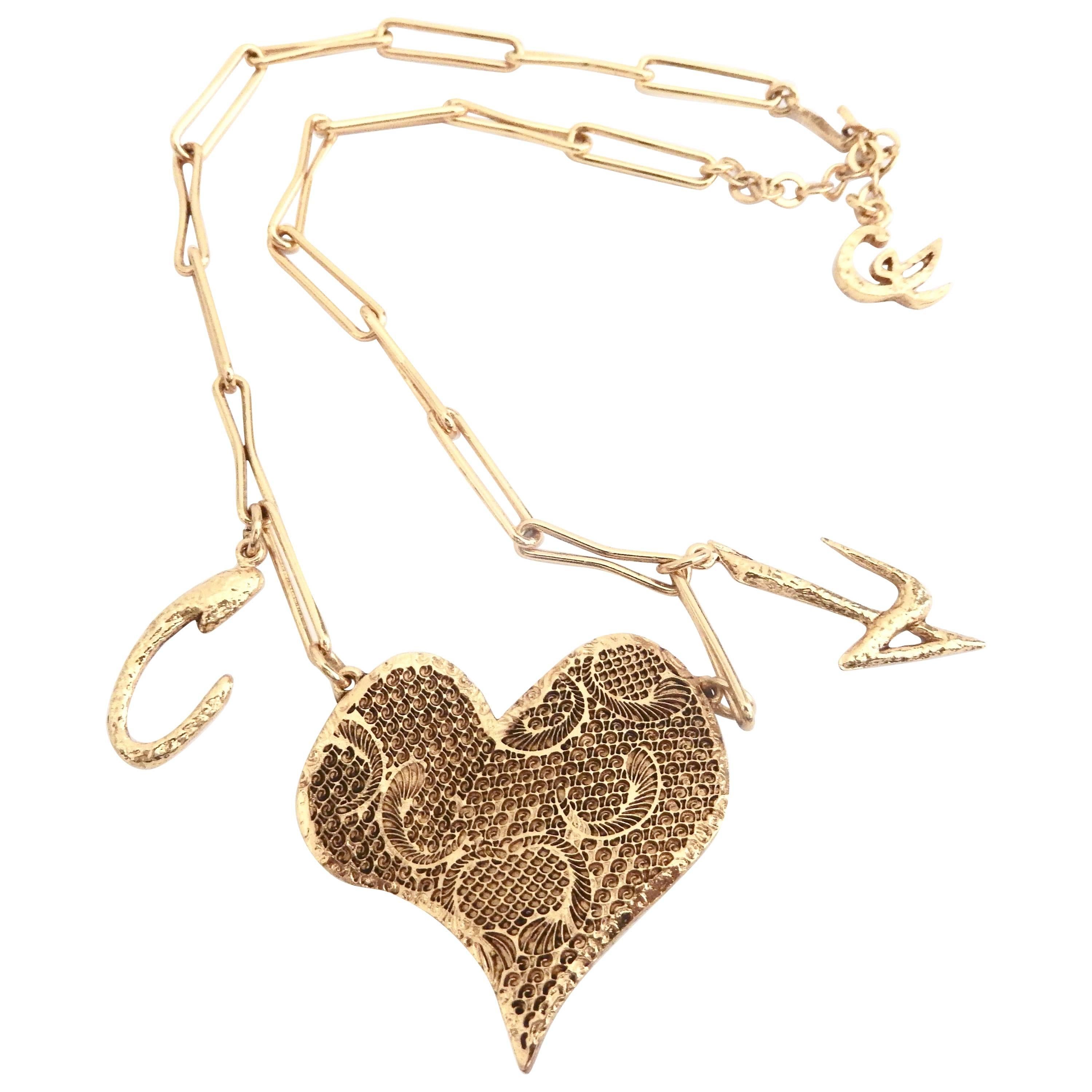 Christian Lacroix Gilt Heart Pendant Necklace with Signature Charms, 1990s  For Sale