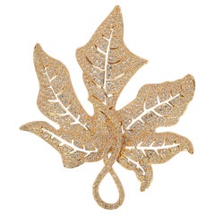 Broche metálico Christian Dior