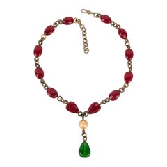 Chanel Necklace Haute Couture in Old Golden Metal with Red Glass Pearls