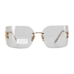 Miu Miu Grey Rimless Logo Sunglasses