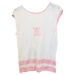 Chanel, top sans manches en coton tricoté blanc avec logo CC rose