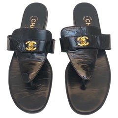 Vintage Chanel black patent leather CC gold hardware turn-lock sandals