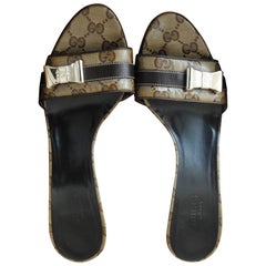 Gucci GG Logo Sandals Gold tone bows