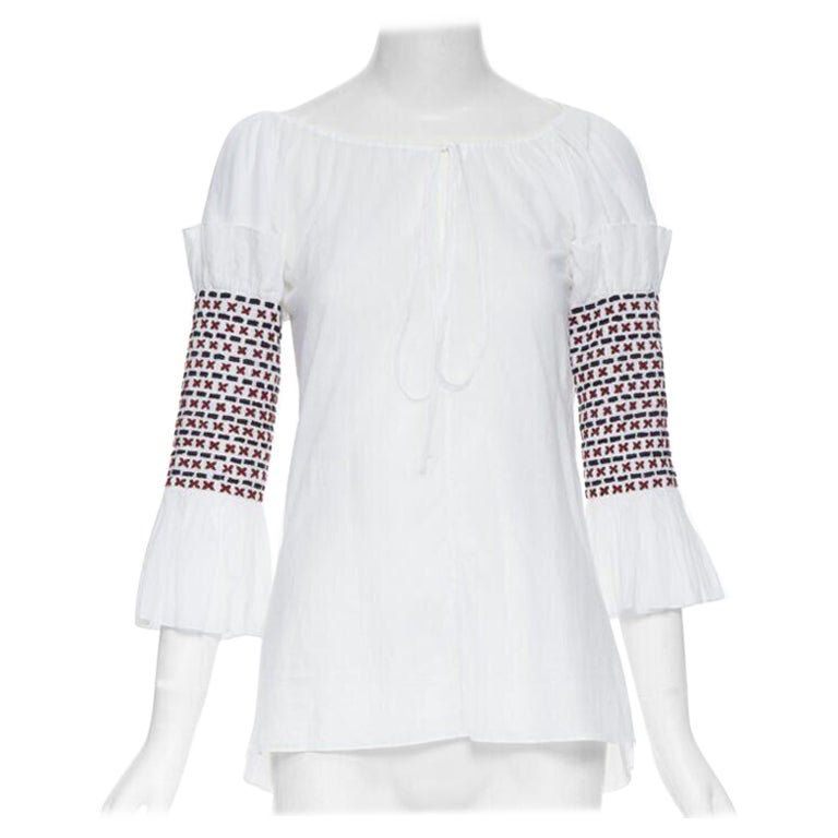 ROSIE ASSOULIN white ethnic embroidery smocked sleeves off shoulder top US0 For Sale