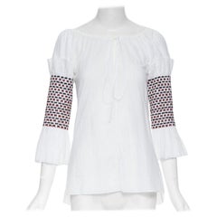 ROSIE ASSOULIN top blanco con bordado étnico y mangas fruncidas US0