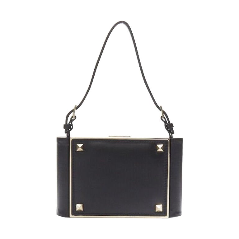 VALENTINO black leather gold rockstud metal frame miniaudiere clasp clutch bag For Sale