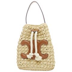 CELINE Teen Triomphe brown leather logo beige raffia drawstring bucket bag