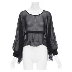 PIERRE BALMAIN Vintage Bluse mit Dolman-Ärmeln aus schwarzer Seide mit durchsichtigen Einsätzen 24/38