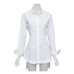 ALAIA camicia hi low in cotone bianco con cuciture sagomate e peplum FR36 S